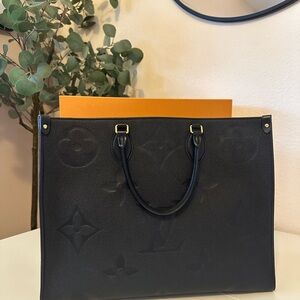 LV On The Go GM Monogram Empreinte Leather